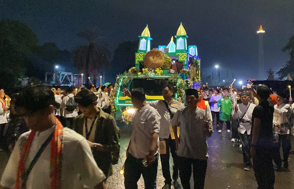 Pawai Obor Berangkat dari Monas, Lantunan Takbir Semarakkan Jalan Thamrin–Sudirman