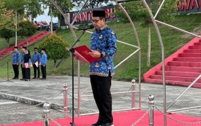 Pimpin Upacara Harkitnas ke-118, Sekda Pelalawan Tekankan Kedaulatan Informasi di Era Digital