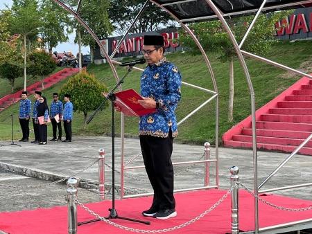 Pimpin Upacara Harkitnas ke-118, Sekda Pelalawan Tekankan Kedaulatan Informasi di Era Digital